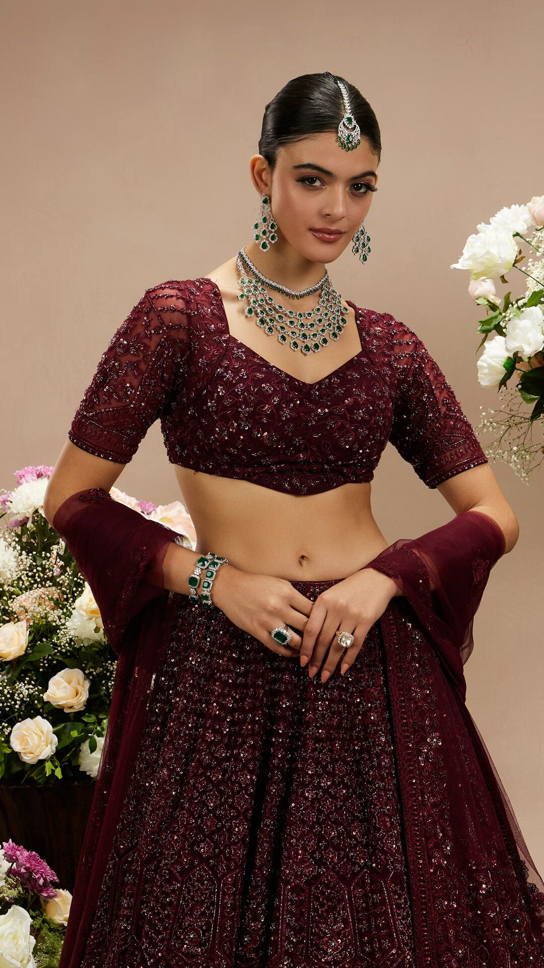  A woman in a beautiful net lehenga